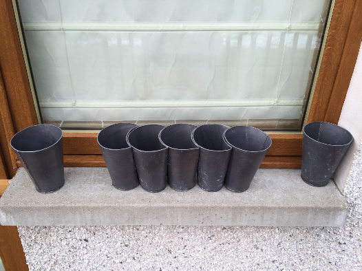curvy and plain lead flowerpots